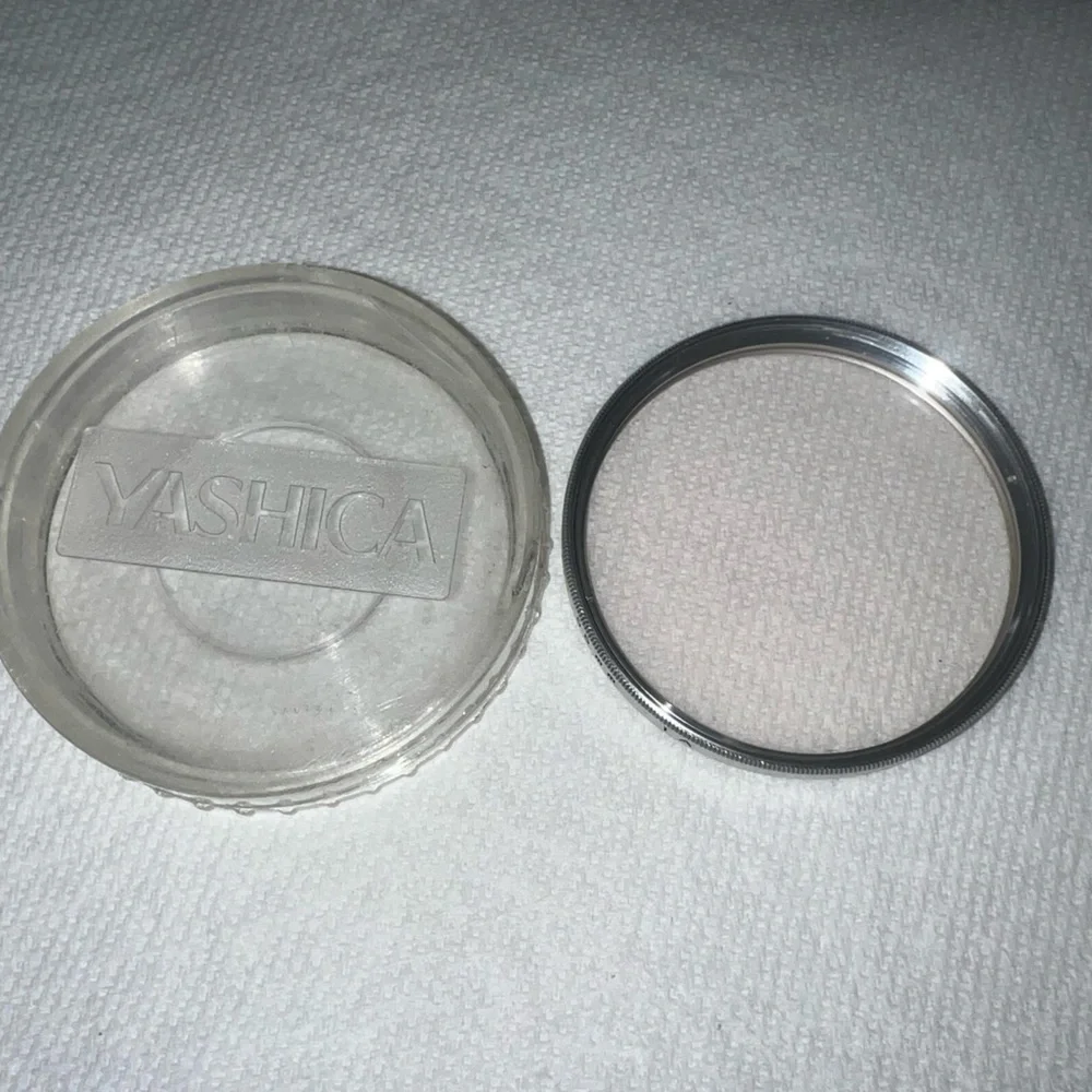 Yashica 55mm Skylight 1A filter.